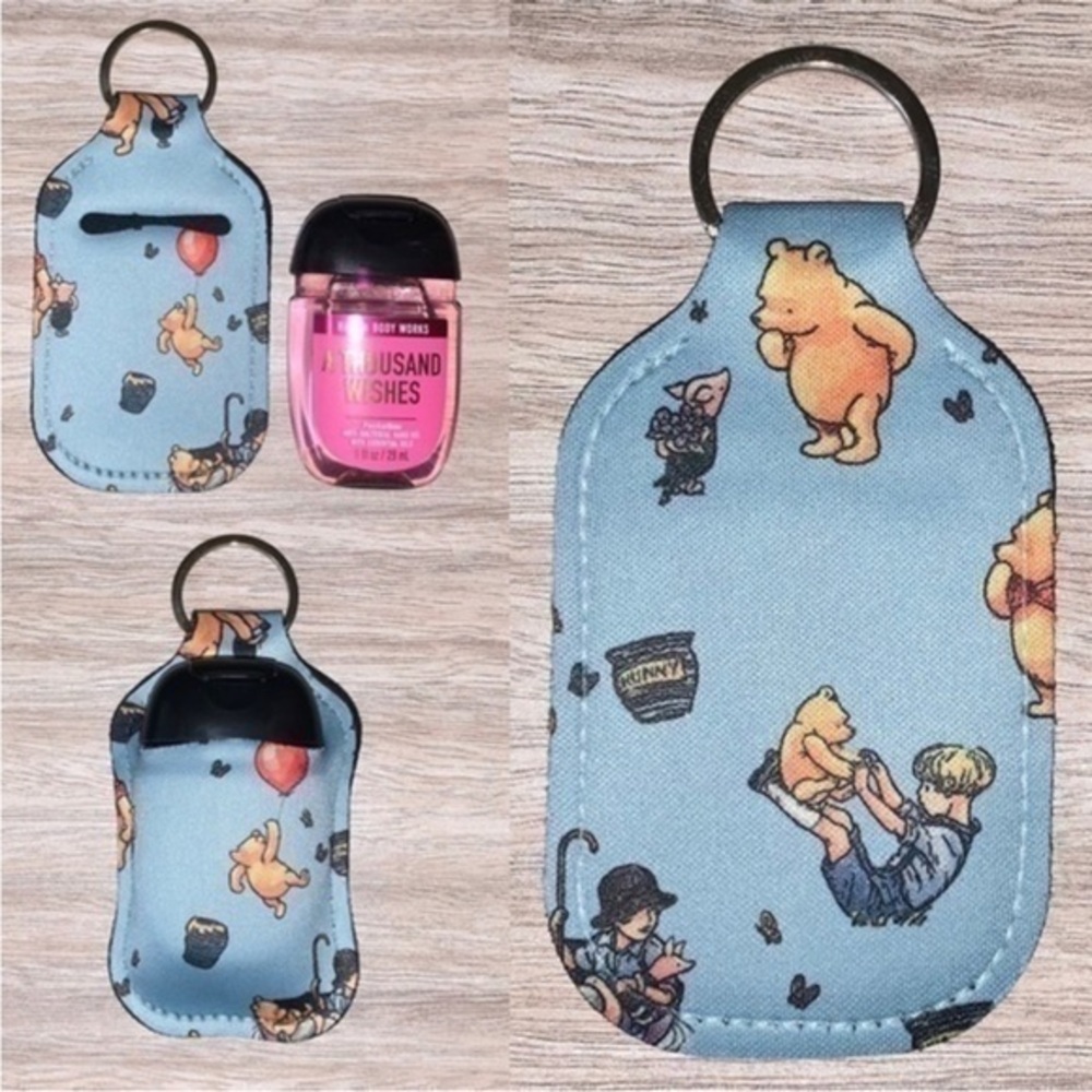 Disney blue Winnie the Pooh hand sanitizer holder new